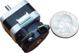 servo motor encoder next to a coin for scale